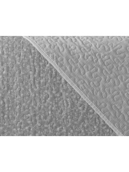 Colcha para verano en color gris y blanco reversible.