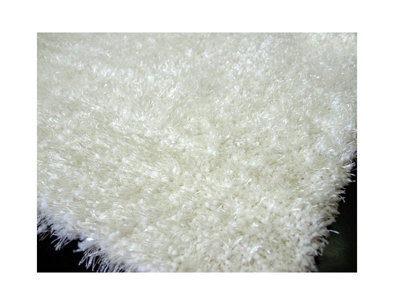 Alfombra de pelo en color liso beige lavable.