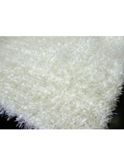 Alfombra de pelo en color liso beige lavable.