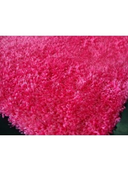 Alfombra de pelo en color liso fucsia lavable.