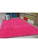 Alfombra de pelo en color liso fucsia lavable.