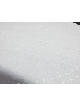 Tapete redondo bordado con topitos en color blanco