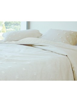 Colcha edredón lisa con detalle de copos de nieve. Diseño original