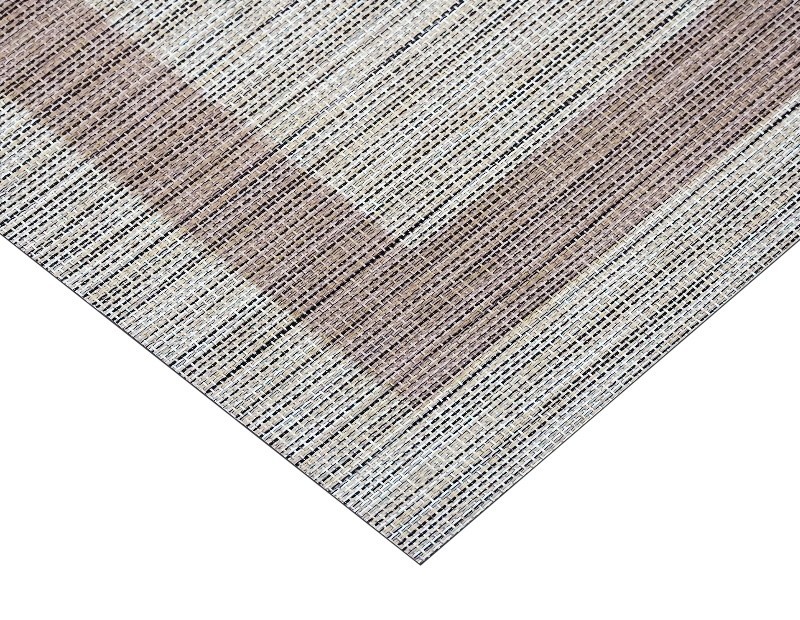 Alfombra Enal en vinilo de Clara Vidal en color marrón beige. Excelente calidad.