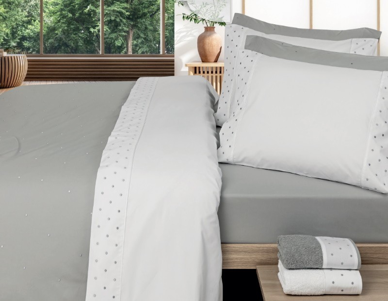 Funda nórdica de topitos en color blanco de algodón fabricada con textil portugués.