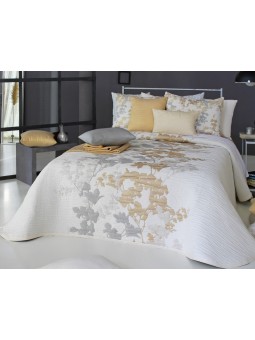 Colcha de Primavera Verano modelo Lyris de Reig Martí en color mostaza oro y gris.