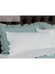 Funda de cojín lencera con volante en algodón percal 200 hilos en color verde agua.