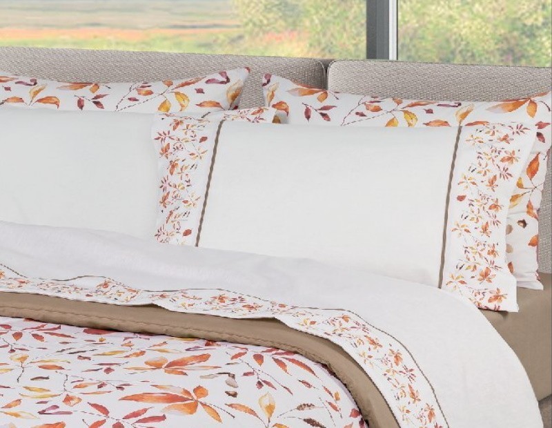 Juego de Sábanas de Invierno en franela  muy suave modelo Rodas de NE HOME textil portugués , en colores naranjas y blanco.