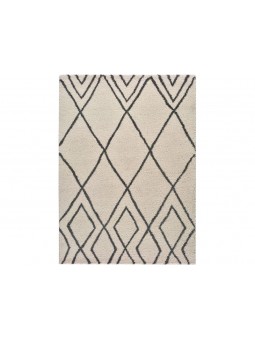 Alfombra con diseño geométrico o étnico en color blanco o beige de pelo largo.