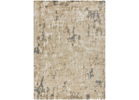 Alfombra estilo étnico en color gris beige y mostaza, pelo estilo shaggy.