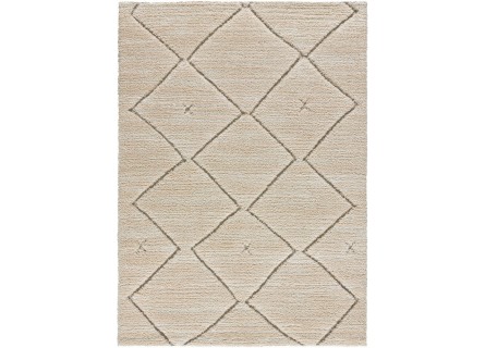 Alfombra estilo étnico en color beige,  pelo estilo shaggy.