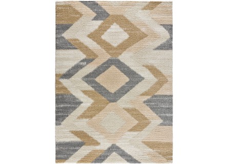 Alfombra estilo étnico en color beige, mostaza, y gris, pelo estilo shaggy.