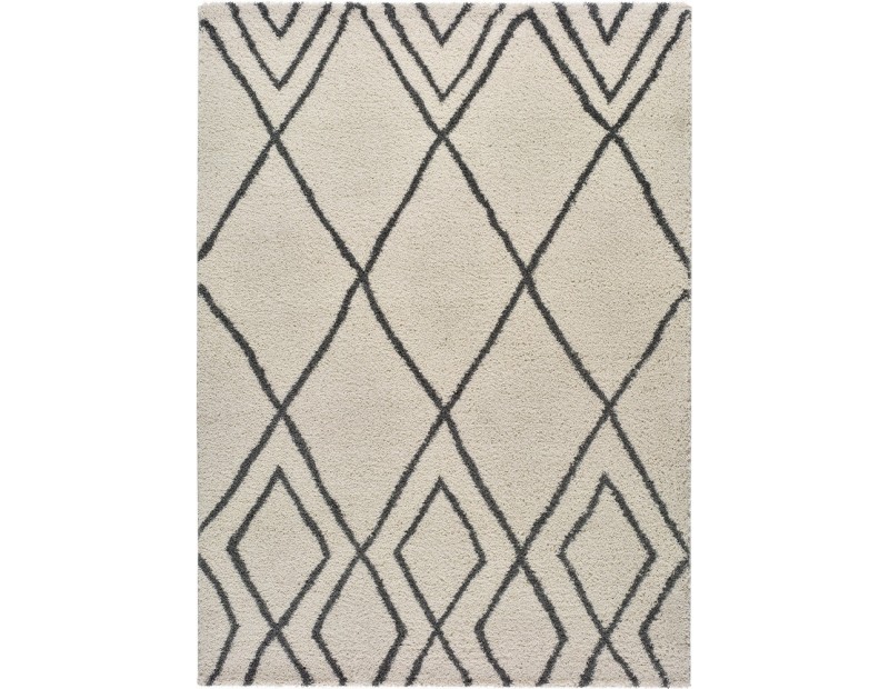 Alfombra con diseño geométrico o étnico en color blanco o beige de pelo largo.