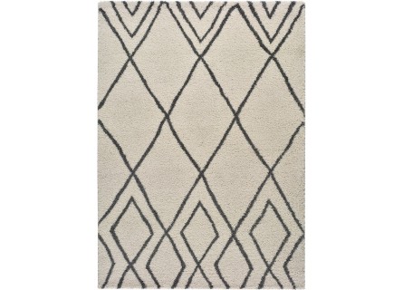 Alfombra con diseño geométrico o étnico en color blanco o beige de pelo largo.