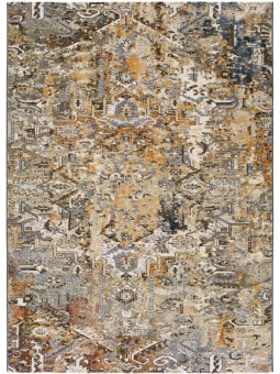 Alfombra vintage en tonos mostaza y gris.