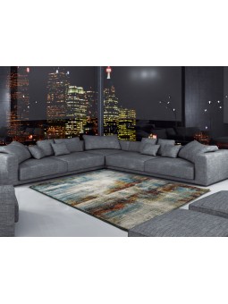 Alfombra con diseño abstracto estilo vintage en diferentes tonos , con turquesa, beige y marrón.