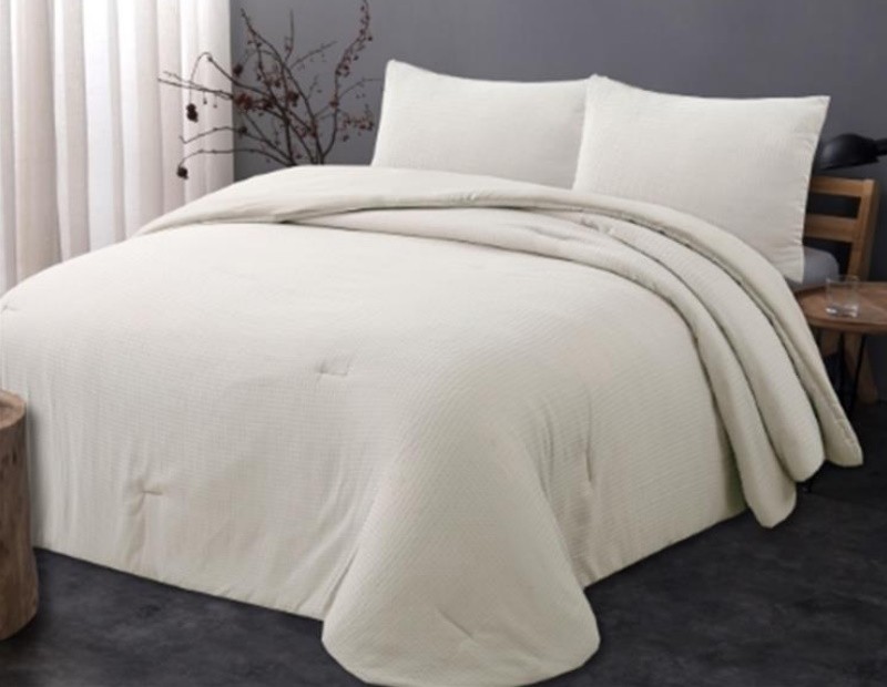 Colcha edredón de gran calidad con tejido de gofrado o nido de abeja en color beige