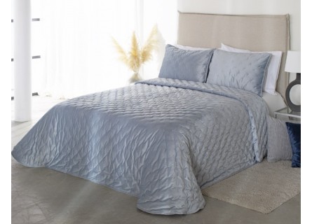 Edredón Pattaya de Reig Marti tejido en terciopelo con bodoque bordado en color azul
