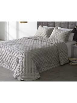 Edredón Pattaya de Reig Marti tejido en terciopelo con bodoque bordado en color gris.