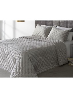Edredón Pattaya de Reig Marti tejido en terciopelo con bodoque bordado en color gris.
