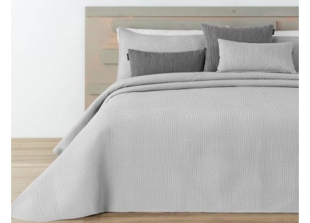 Colcha bouti de nido de abeja de gran calidad de Manterol con fundas de cojín en color gris.