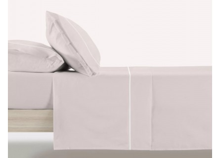 Juego de sábanas de Manterol en color liso beige.