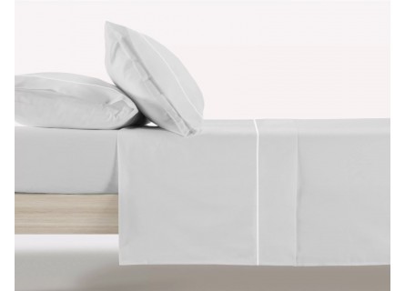 Juego de sábanas de Manterol en color liso gris.