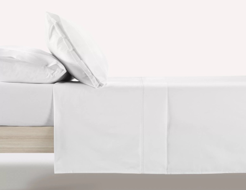 Juego de sábanas de Manterol en color liso blanco.