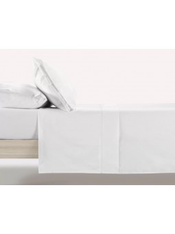 Juego de sábanas de Manterol en color liso blanco.