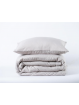 Edredón con tejido lavado  la piedra en color arena 
 beige liso de gran calidad.