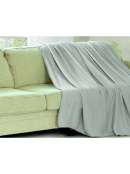 Manta plaid lisa en gris con tejido super suave de gasa y coralina ideal para salón o cama.