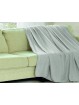 Manta plaid lisa en gris con tejido super suave de gasa y coralina ideal para salón o cama.