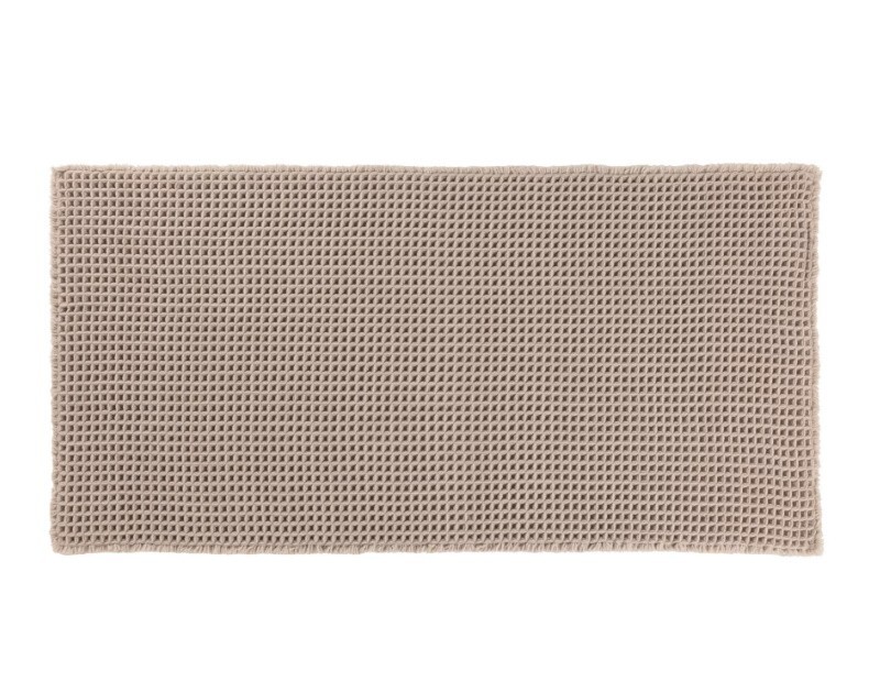 Alfombra de pie de cama de tela antideslizante en tejido de nido de abeja beige.