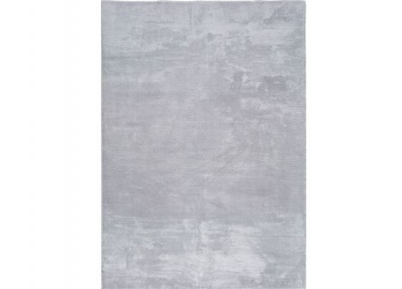 Alfombra en color liso de tejido extra suave en color gris claro.