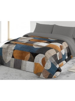 Edredón nórdico Calista estampado con dibujo geométrico en tonos grises, azules, mostazas y negro.